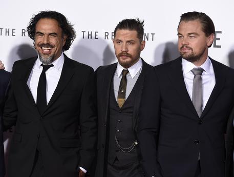 Alejandro Gonzalez Inarritu, Tom Hardy e Leonardo DiCaprio © AP
