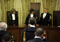 Sentenza del Processo Mills al tribunale di Milano. Nella foto da sinistra i giudici Antonella Lai, Francesca Vitale e Caterina Interlandi