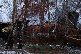 This photograph taken on November 25, 2024 shows the wreckage of the  cargo plane