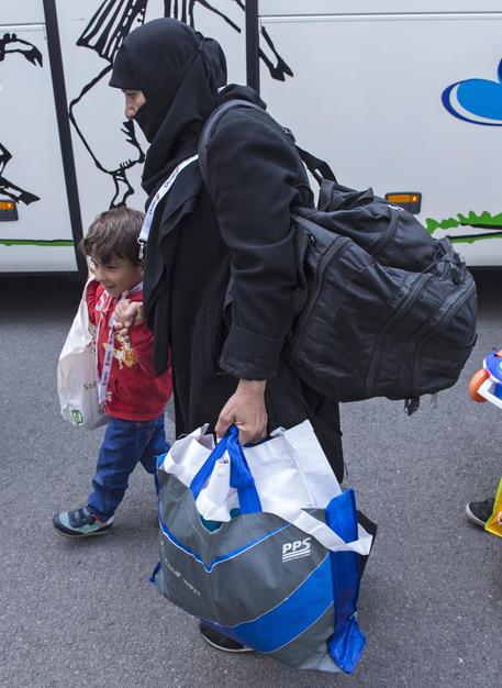 Migranti a Berlino © AP