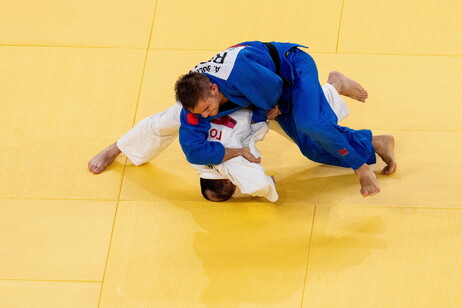 Judo Sherzod Namozov of Uzbekistan (white) against Alex Bologa Romania (blue) at the Nippon Budokan