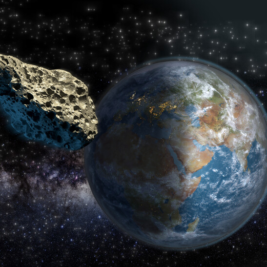 Rappresentazione artistica del passaggio ravvicinato alla Terra di un asteroide (fonte: 3000ad, iStock)