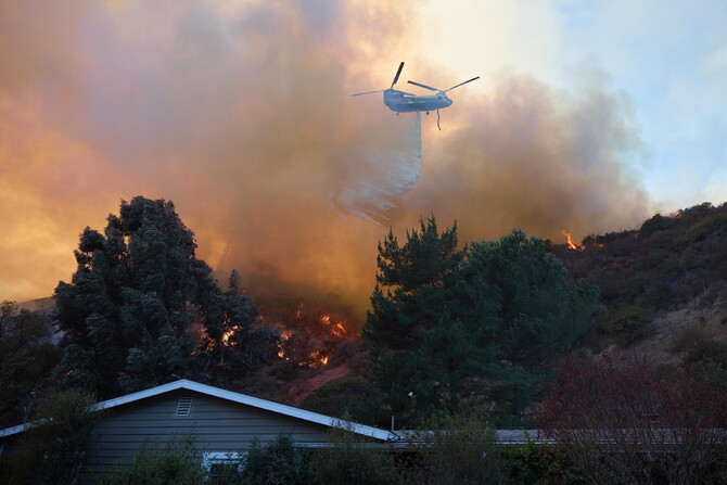 Wildfires continue to rage through Los Angeles area