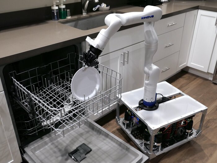 TidyBot++, il robot domestico che carica la lavatrice e annaffia le piante  VIDEO