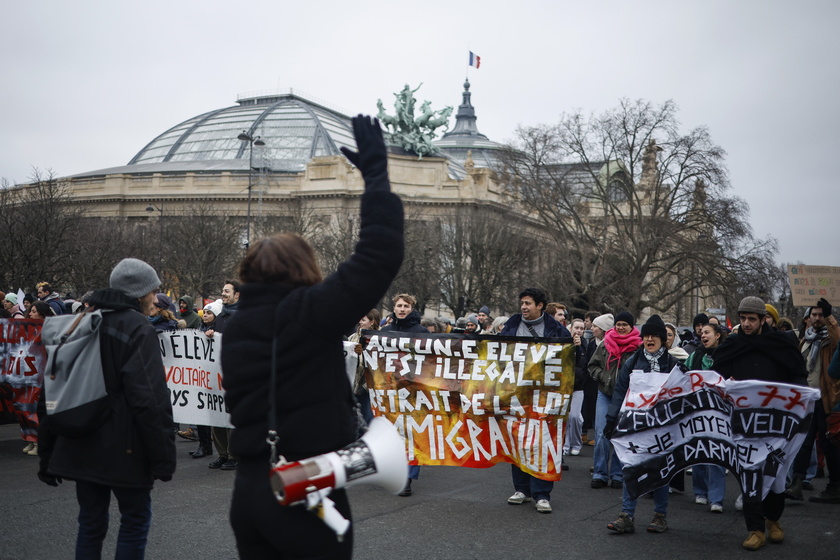 Rally against new French immigration law, in Paris - RIPRODUZIONE RISERVATA