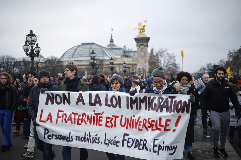 Rally against new French immigration law, in Paris - RIPRODUZIONE RISERVATA