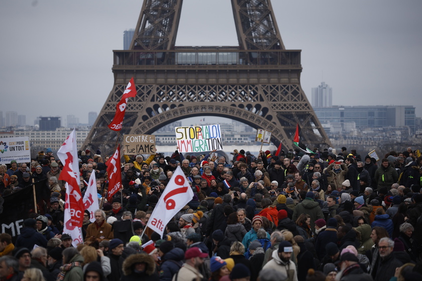 Rally against new French immigration law, in Paris - RIPRODUZIONE RISERVATA