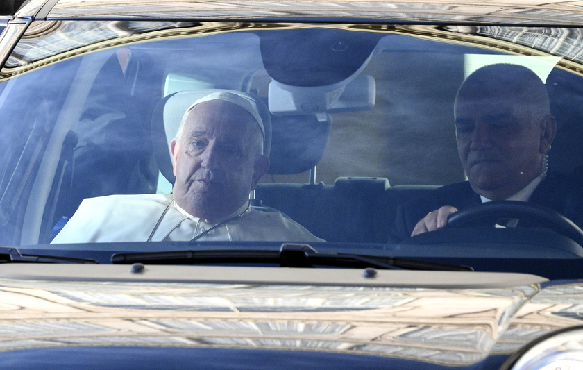 Pope Francis arrives at San Damaso courtyard at the Vatican