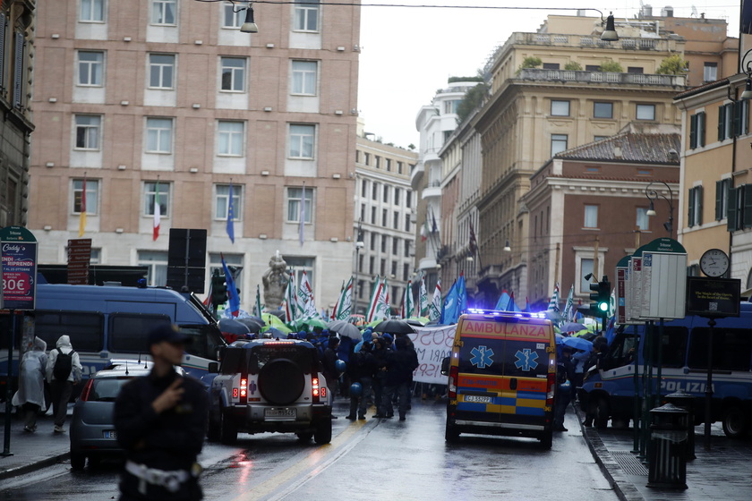 Italian automotive workers hold a protest rally in Rome