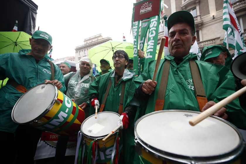 Italian automotive workers hold a protest rally in Rome