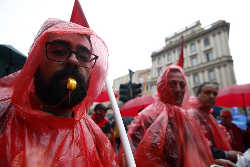 Italian automotive workers hold a protest rally in Rome