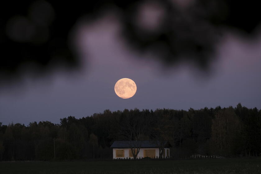 Supermoon rises over Riga