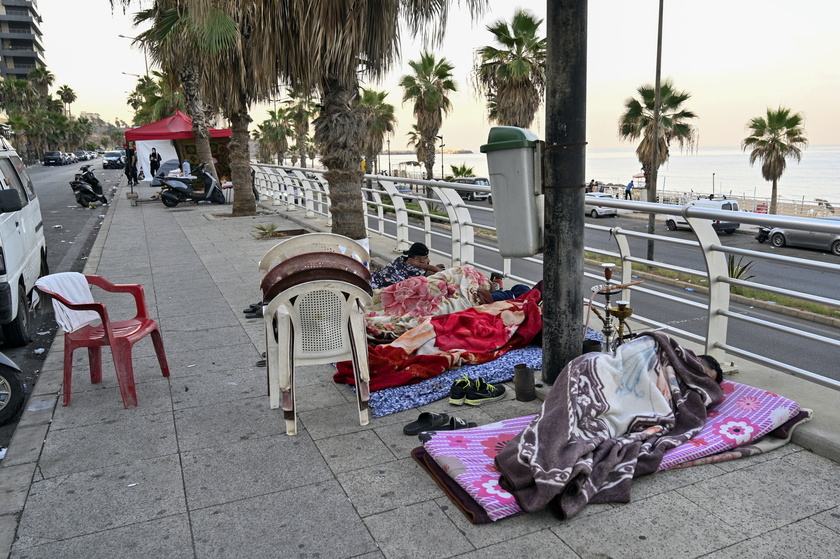 Displaced people stay at streets in Beirut