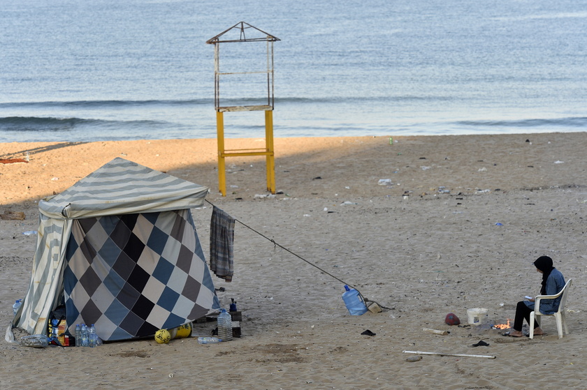 Displaced people seek shelter on Beirut's Ramlet al-Baida beach