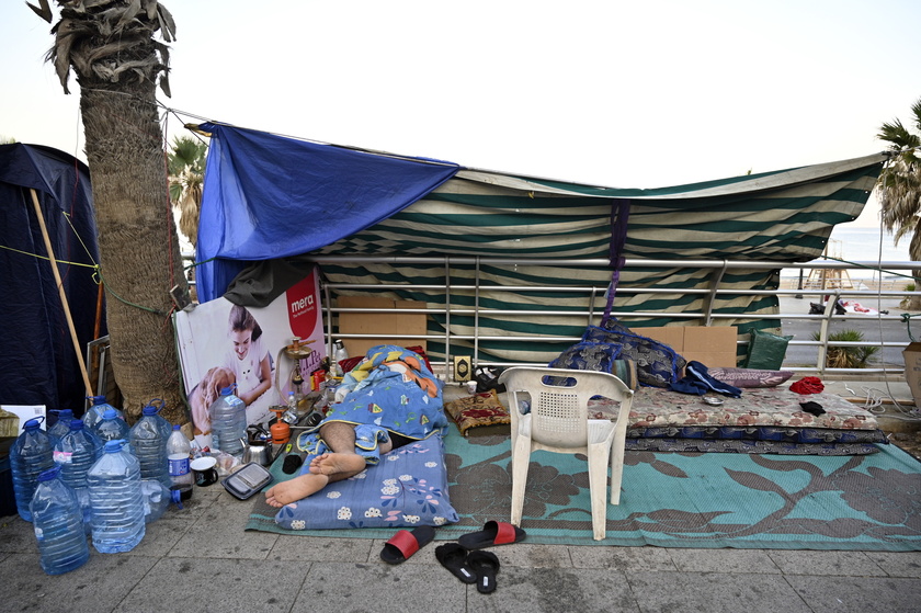 Displaced people stay at streets in Beirut