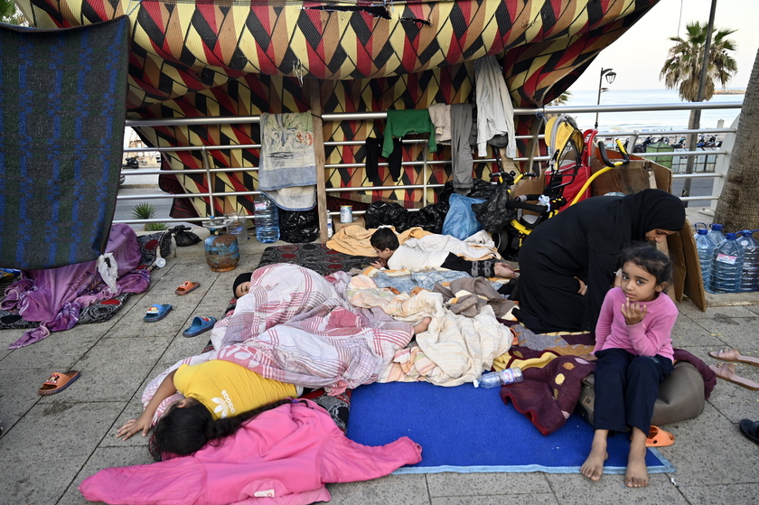 Displaced people seek shelter on Beirut's Ramlet al-Baida beach