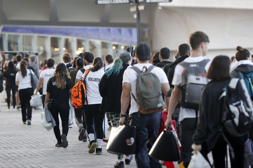 People volunteer to help people affected by flash floods in Valencia