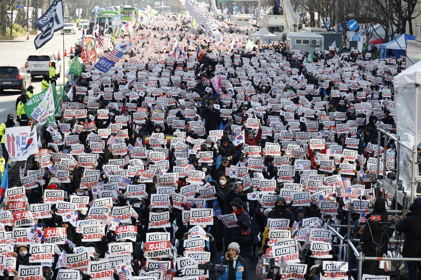 Supporters of South Korean President Yoon hold rally ahead of impeachment vote 