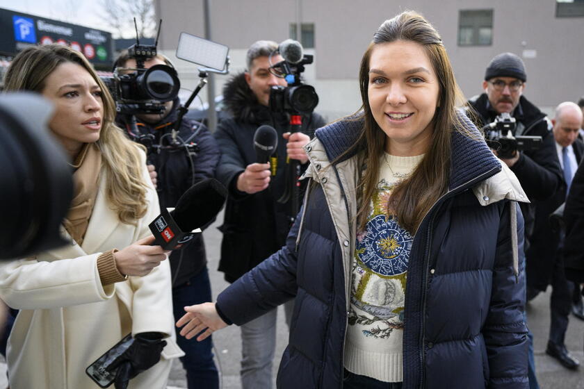 Former WTA number 1 tennis player Simona Halep arrives for arbitration hearing