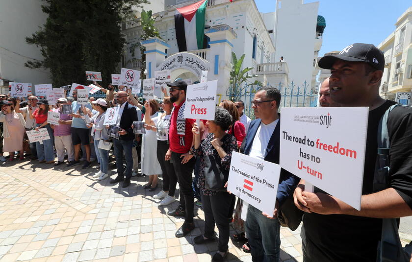 Journalists protest during a press freedom rally in Tunis