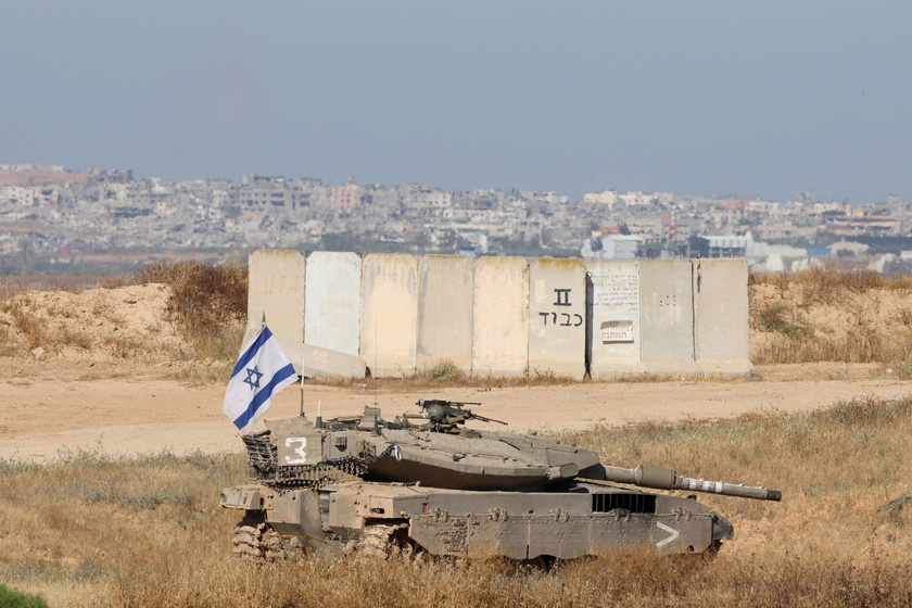 Israeli troops gather near the Gaza border, southern Israel