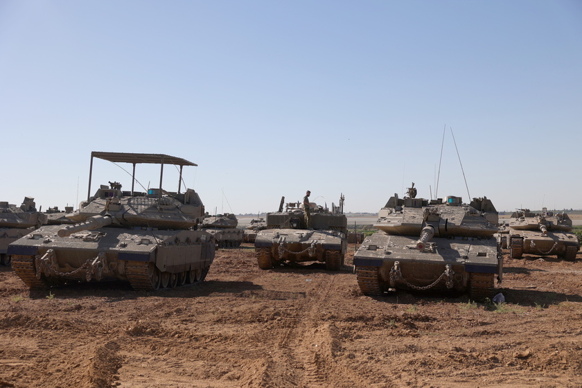 Israeli troops gather near the Gaza border, southern Israel