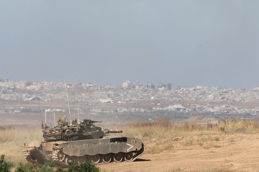 Israeli troops gather near the Gaza border, southern Israel