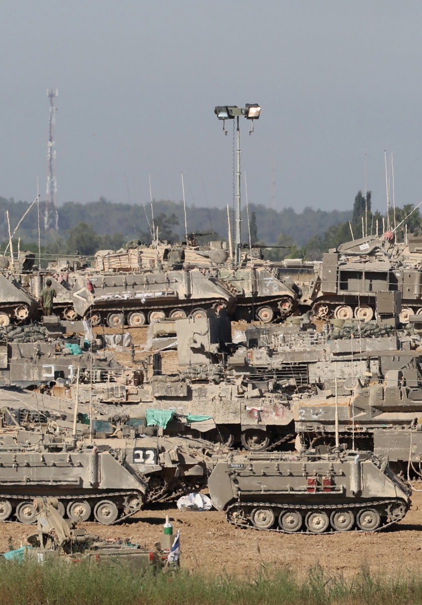 Israeli troops gather near the Gaza border, southern Israel