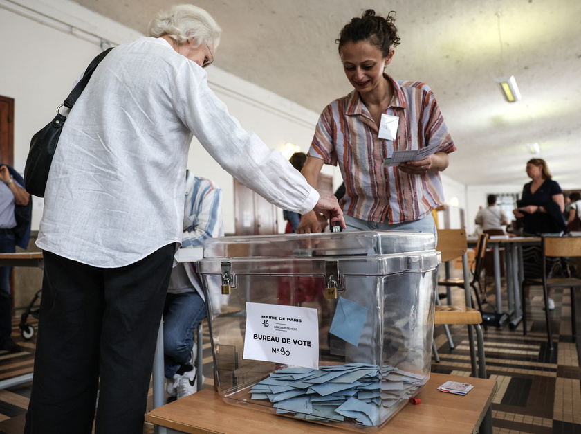 France holds first round of snap parliamentary elections