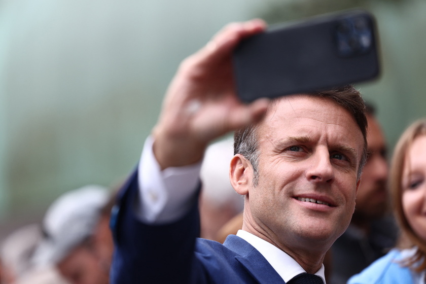 French President Macron votes in snap parliamentary elections
