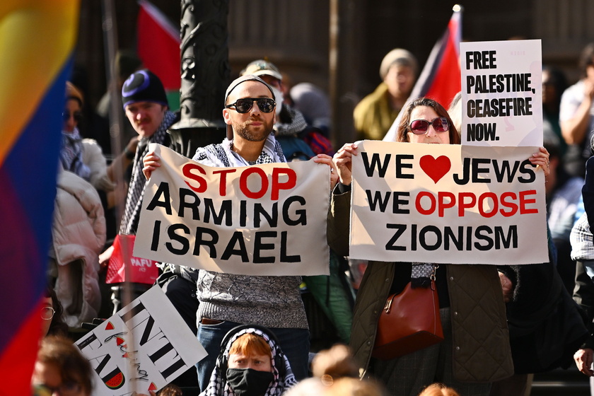 People hold a pro-Palestinian rally in Melbourne