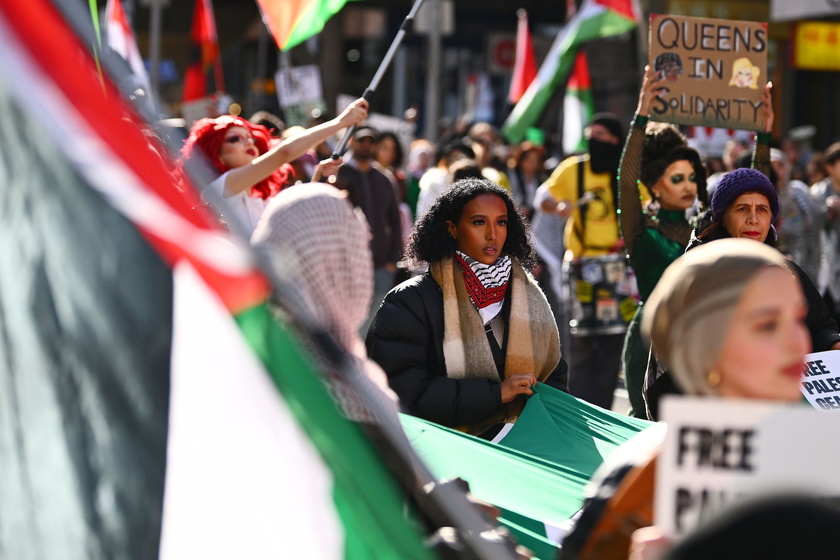 People hold a pro-Palestinian rally in Melbourne