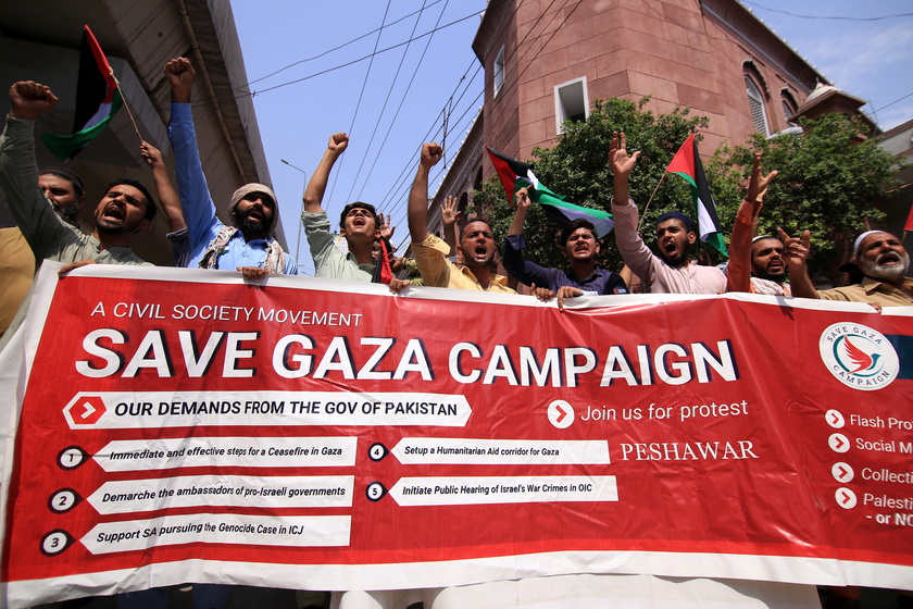 Civil society activists rally in solidarity with the Palestinian people in Peshawar