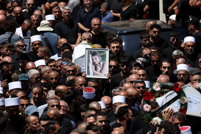 Relatives attend funeral of victims in Majdal Shams, after missile attack from Lebanon