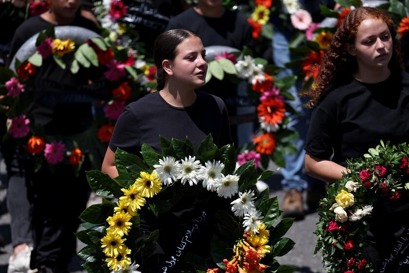 Relatives attend funeral of victims in Majdal Shams, after missile attack from Lebanon