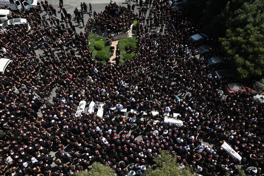 Relatives attend funeral of victims in Majdal Shams, after missile attack from Lebanon