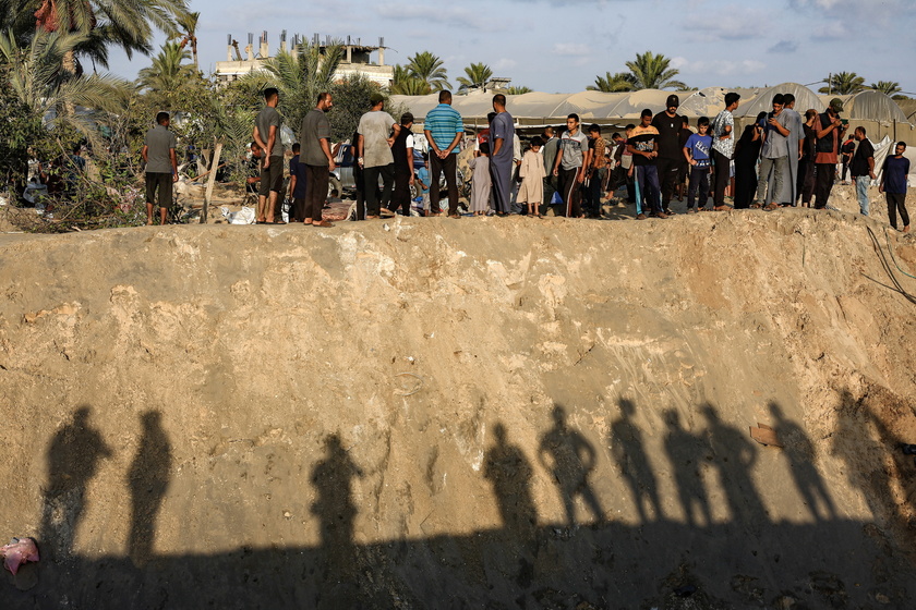 Palestinians search for missing people following Israeli airstrikes on Al-Mawasi humanitarian zone