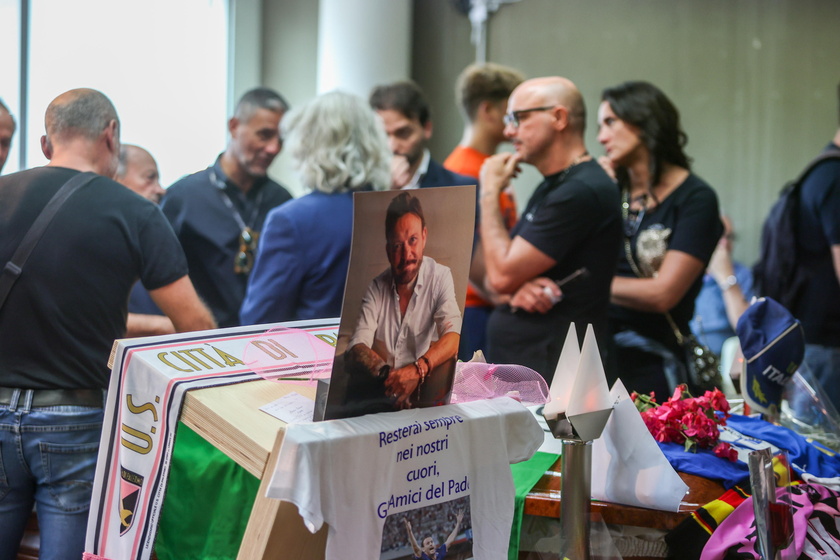 People pay their respects to the late Italian soccer player Schillaci in Palermo