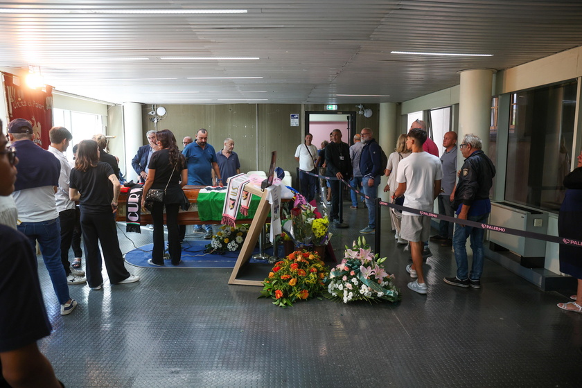 People pay their respects to the late Italian soccer player Schillaci in Palermo