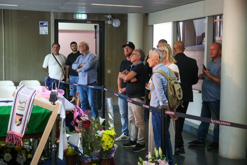 People pay their respects to the late Italian soccer player Schillaci in Palermo