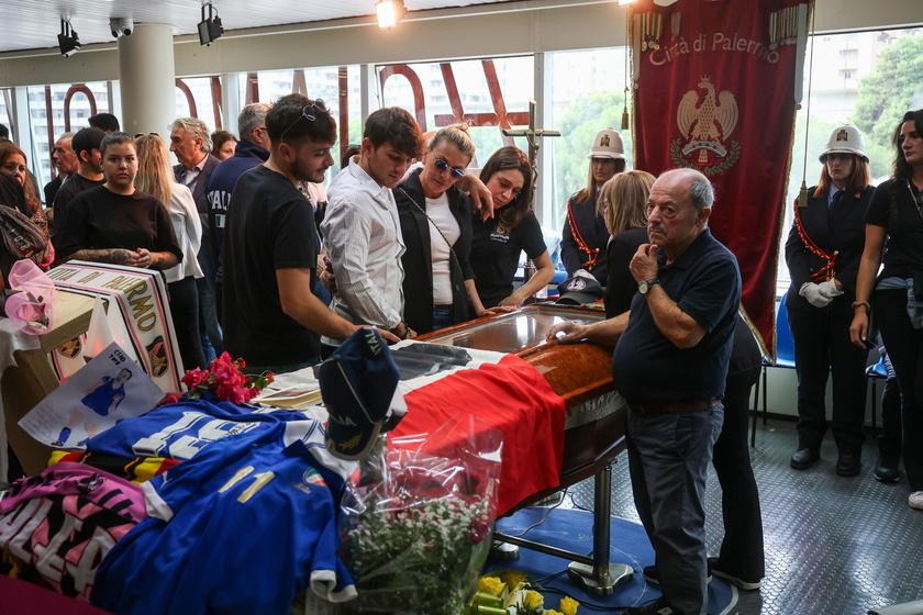 People pay their respects to the late Italian soccer player Schillaci in Palermo