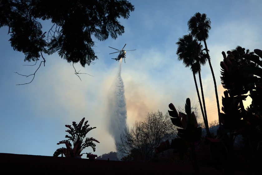 Wildfires continue to rage through Los Angeles area