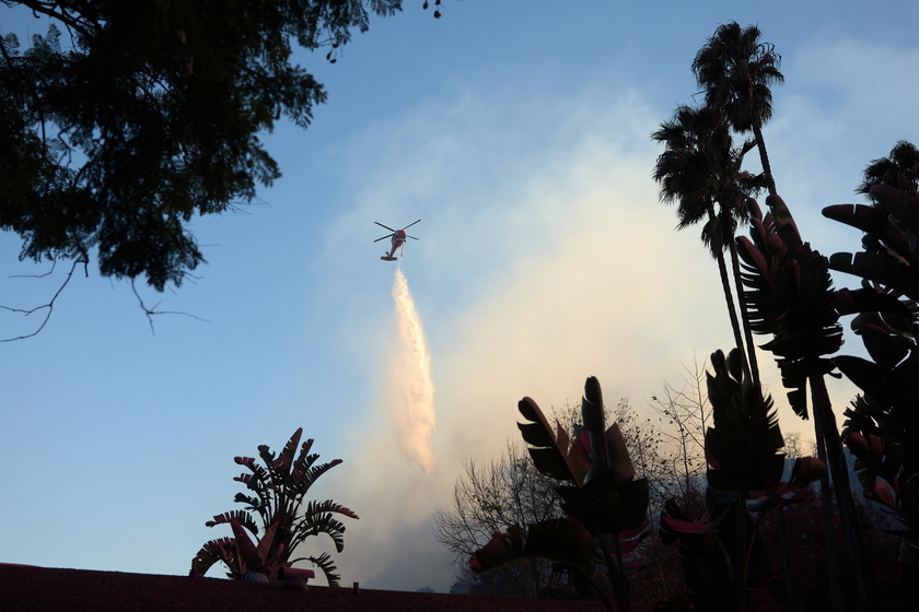 Wildfires continue to rage through Los Angeles area