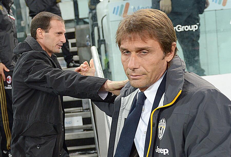 L'allenatore Massimiliano Allegri del Milan Con Antonio Conte allo Juventus Stadium, Torino,6 Ottobre 2013 © Ansa