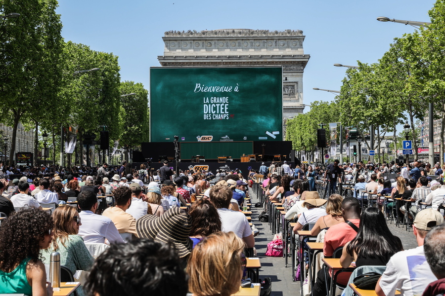 A massive dictation event took over the iconic Champs-Élysées