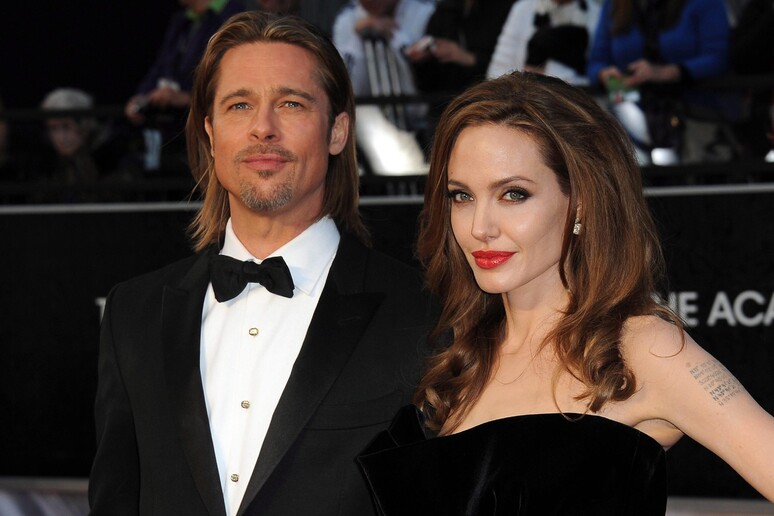 Brad Pitt e Angelina Jolie - RIPRODUZIONE RISERVATA