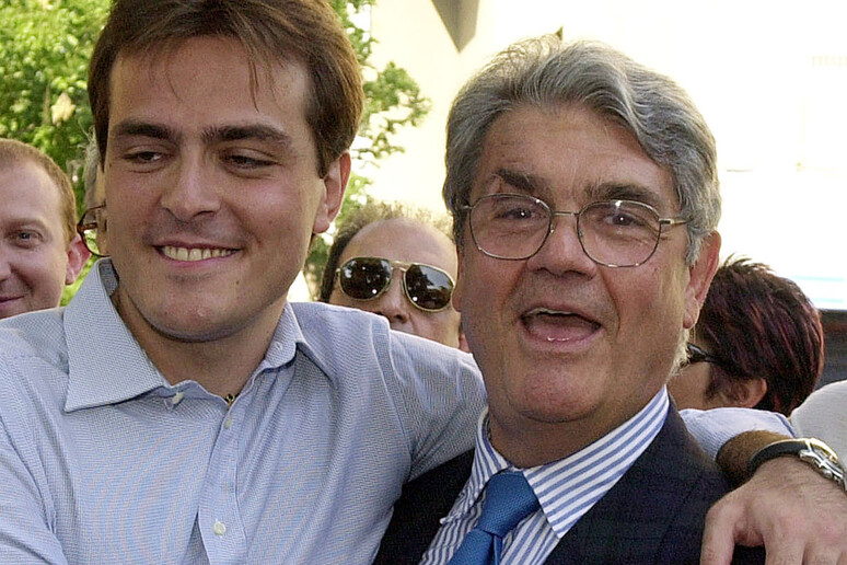 Mannino with his son, after being acquitted -     ALL RIGHTS RESERVED