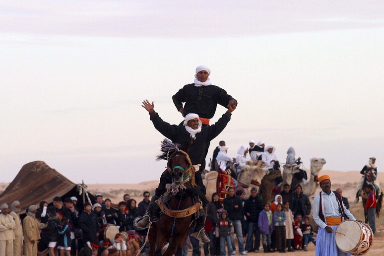 Spettacolo del Festival internazionale del Sahara di Douz, in Tunisia -     RIPRODUZIONE RISERVATA