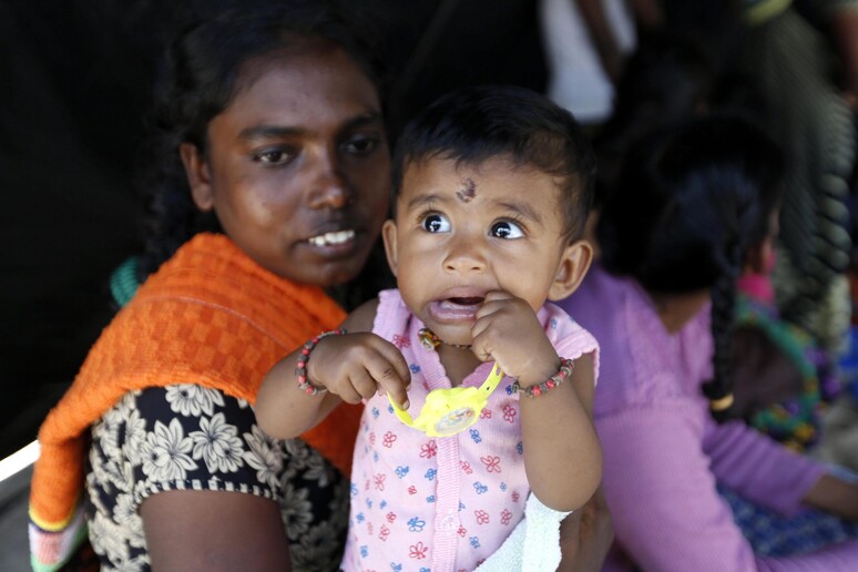 Foto d 'archivio di una migrante dello Sri Lanka © ANSA/EPA