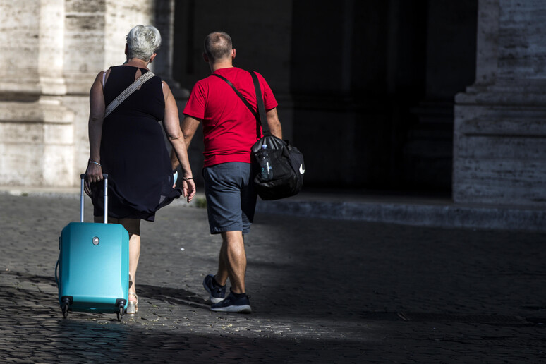 Turisti a Roma - RIPRODUZIONE RISERVATA